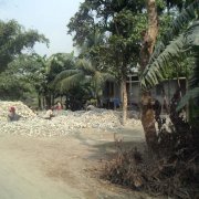 Villagers breaking stones