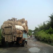 Driver making repairs to road